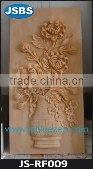 White marble flower relief