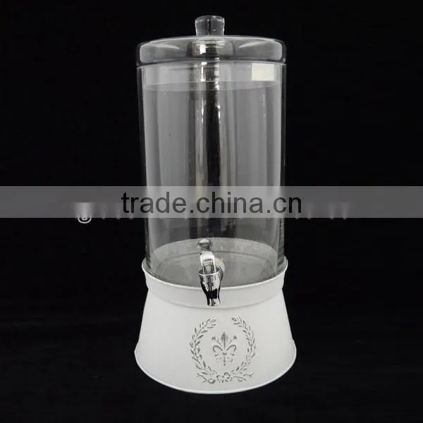 country style clear round juice dispenser with white metal ice bucket