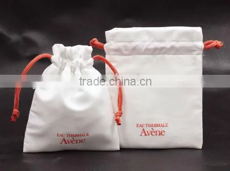 white cotton cosmetic bag with drawstring