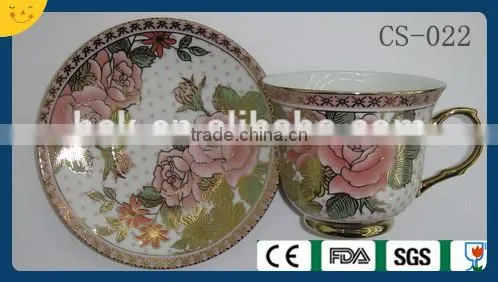 colored cafe tea cup and saucer