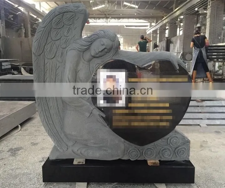 granite tombstone;angel with heart granite tombstone;hand carved headstone