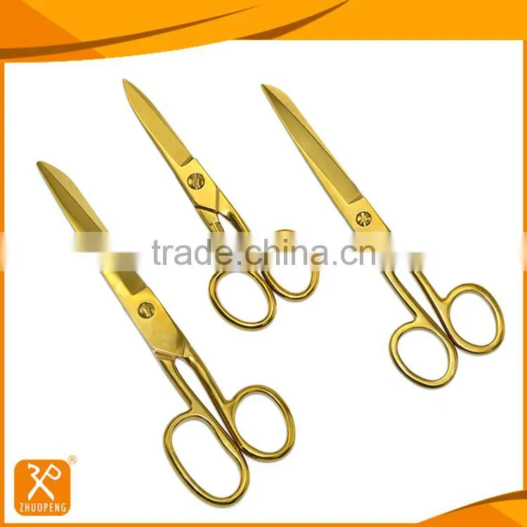 Full stainless steel scissors with gold-plating handle