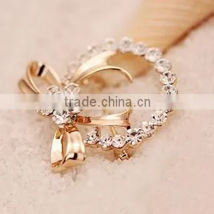 GOLDEN COLOR ZINC ALLOY BOWKNOT RHINESTONE BROOCH