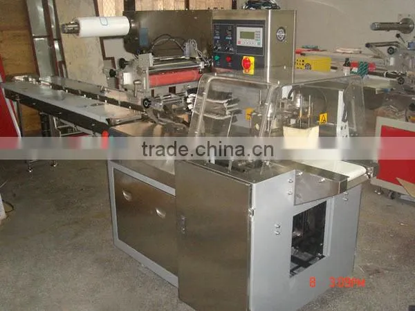 High speed sanitary napkin tissue paper roll packing machine