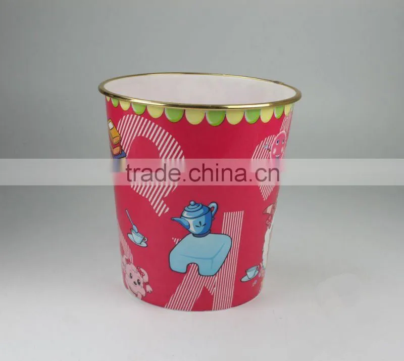 Plastic waste bin with golden edge