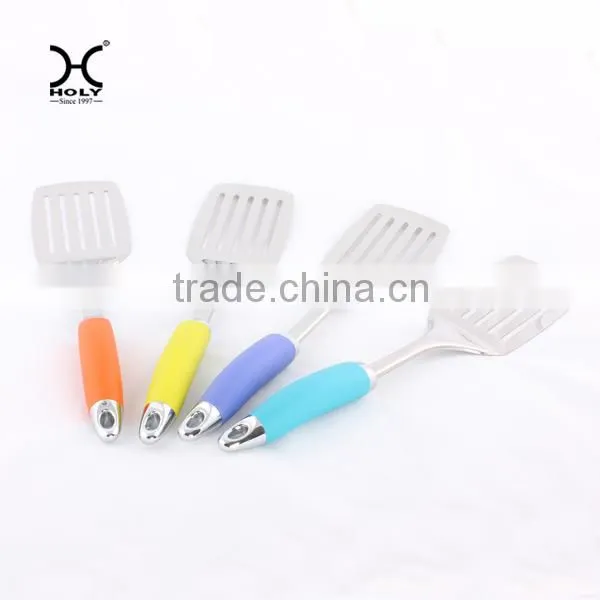 slotted turner with 0range handle