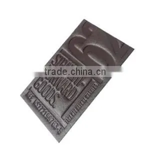 2016 China manufacture Embossed Faux Leather Label Denim
