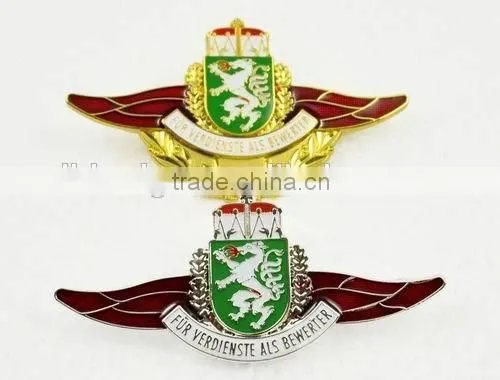 safety pin badge, school emblem, national emblem; school badge