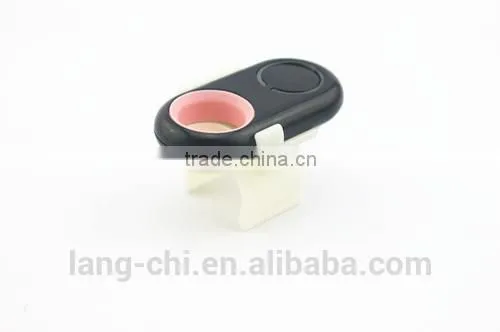 Mini wireless remote shutter for selfie stick on monopod