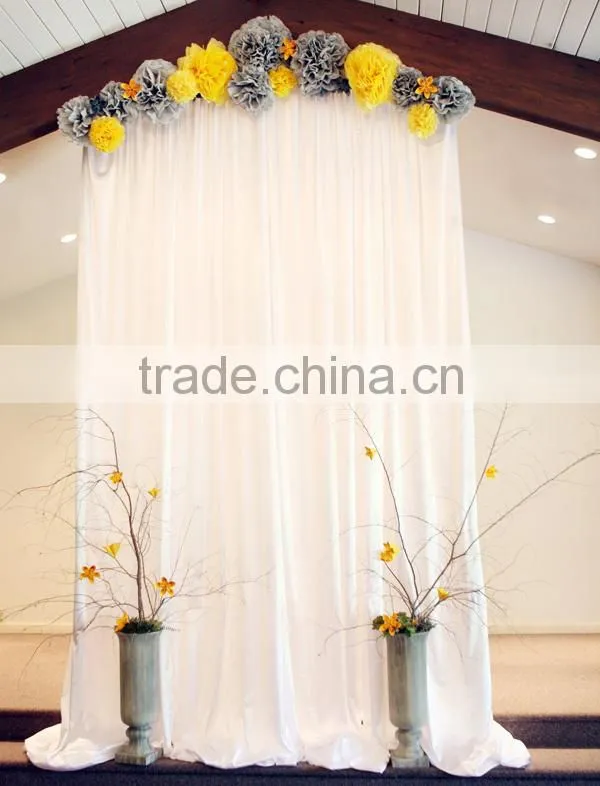fancy and elegant pipe and drape wedding backdrop