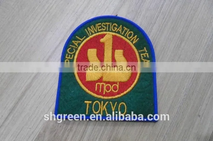 Uniform shoulder embroidery emblem with gold metallic thread