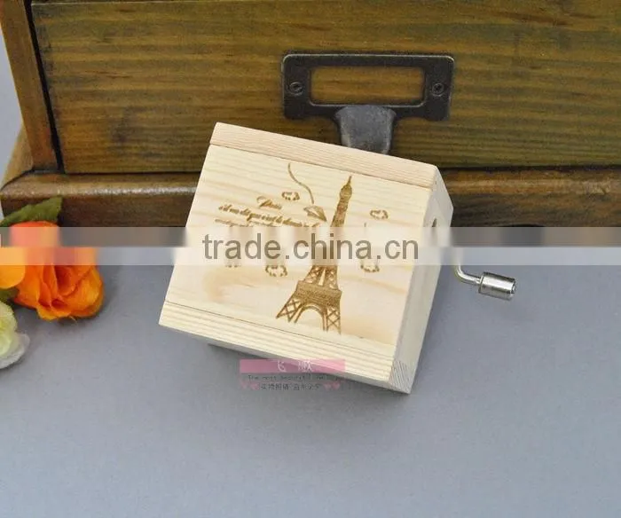 Natural wood color rotating music box