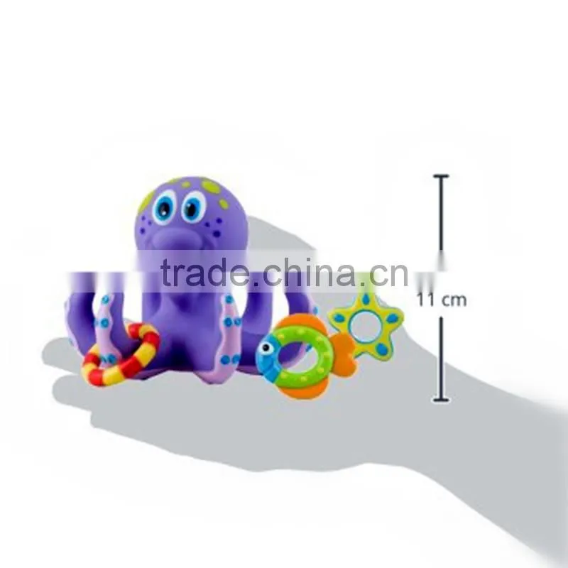 mini plastic purple Octopus and three Hula Hoops for baby bath time fun