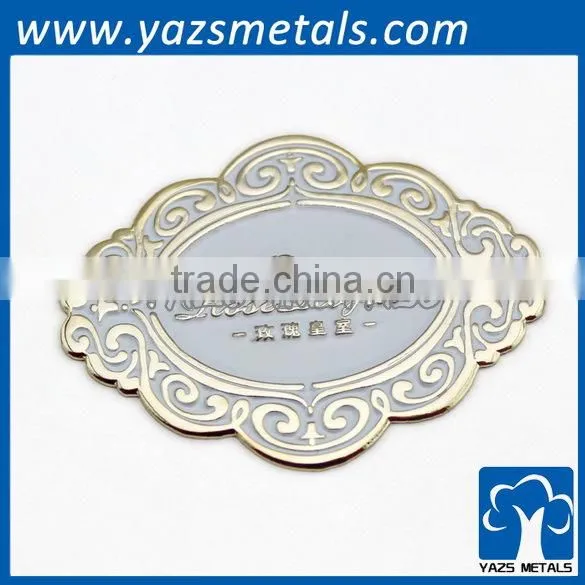 Embossed metal furniture palte
