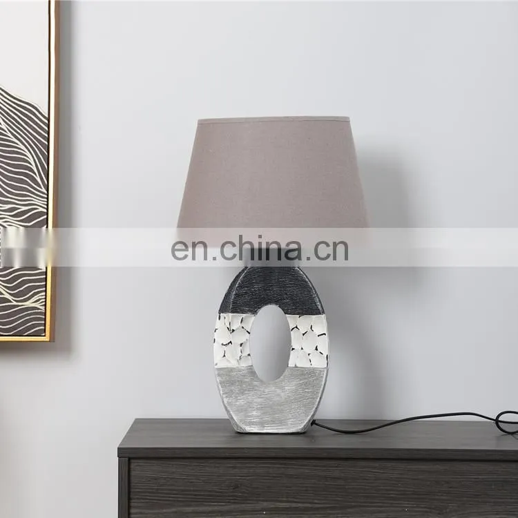 Modern art style grey and white base bedroom ceramic desk lamp for hotel