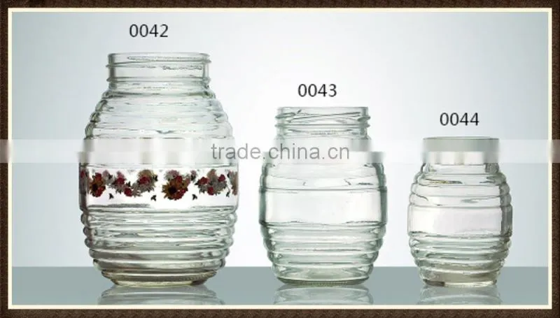 Honeycomb shape glass honey jar with tap for wholesale online