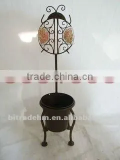 tiny chair with metal flower pot