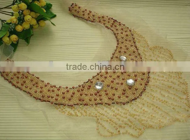 Handmade beaded appliques design of neck of suit
