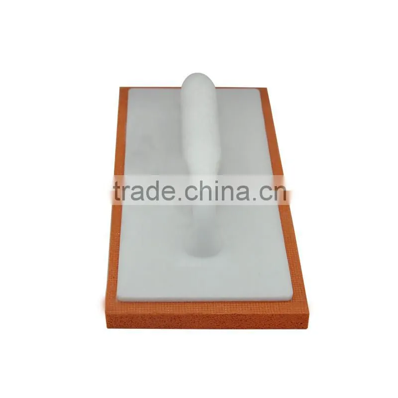 High density orange masonry float with plastic handle sponge plastering trowel