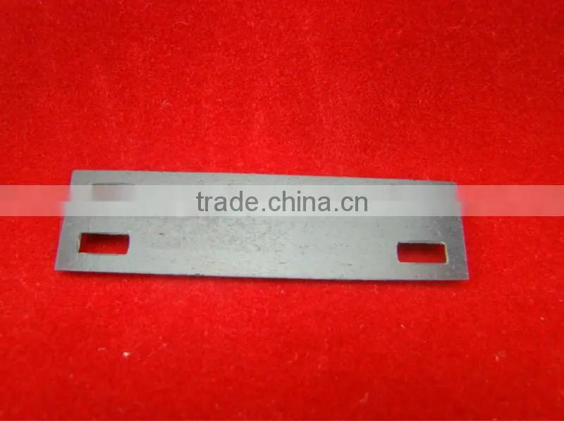 Self adhesive ABS tag with holes