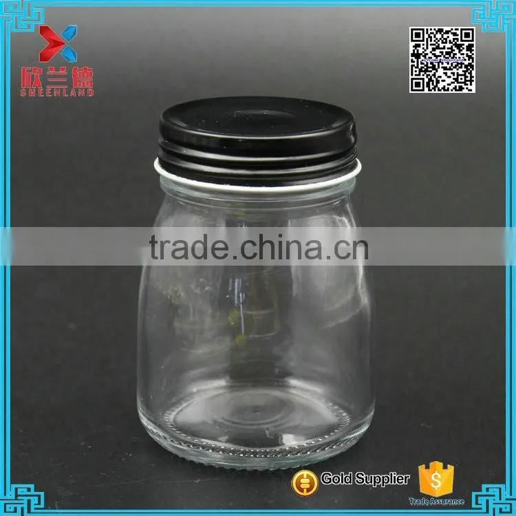 100ml clear cheap empty pudding glass milk bottle with black cap