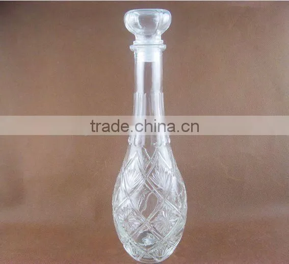 Glassware, glass wine bottle with lid