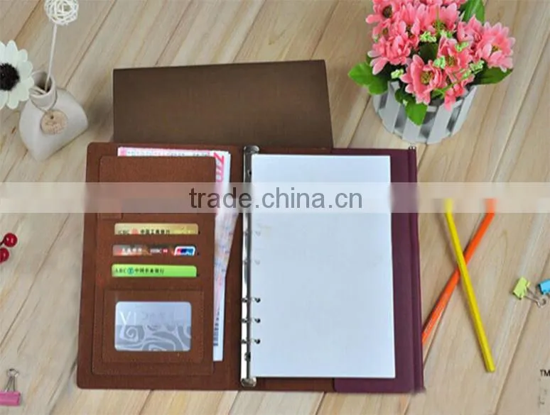 2015 brown or purple leather notebook with embossing pattern
