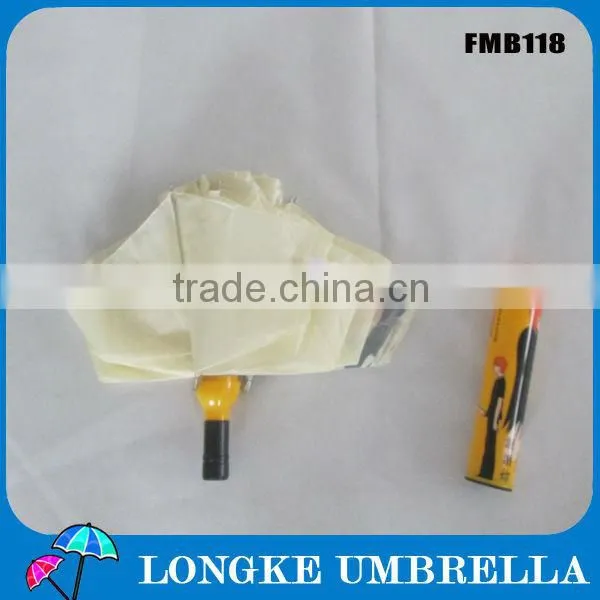2013popular promotion 3fold yellow manual open outdoor carton beer wine bottle umbrella
