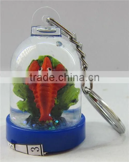 Fish snow globe used as plastic key chain