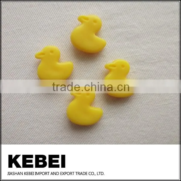 China bulk pattern buttons,no hole craft yellow duck buttons