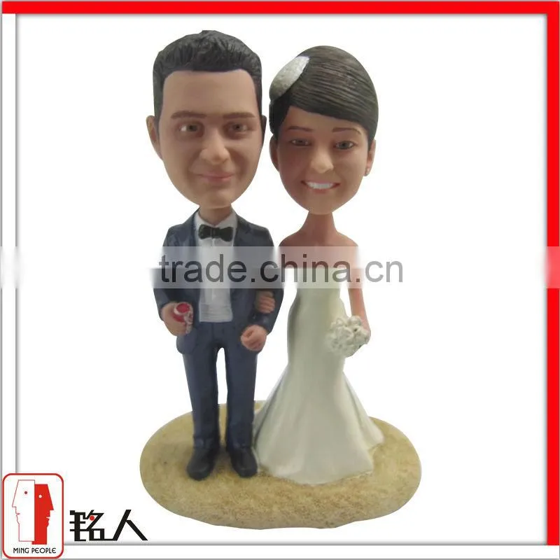 resin silver wedding cake topper