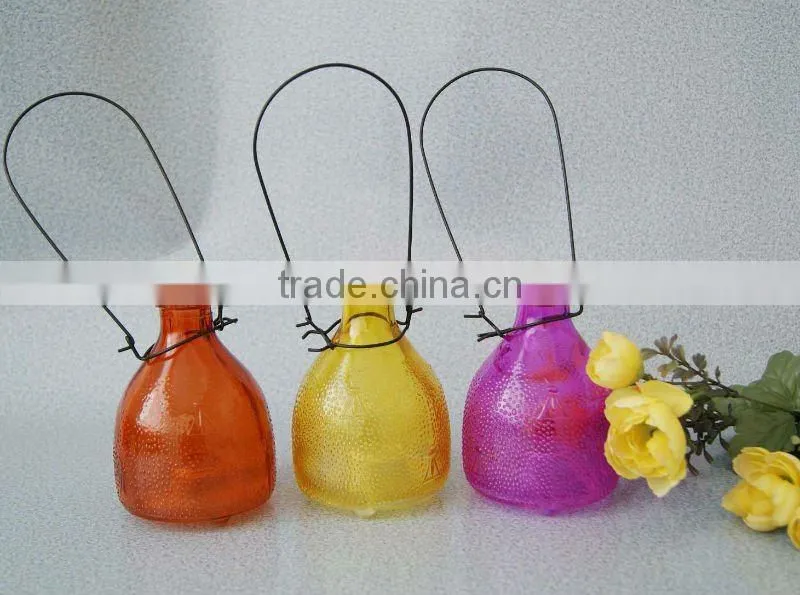 middle size colored glass wasp bottle