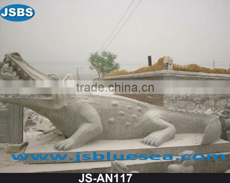 Carved red marble lion statue