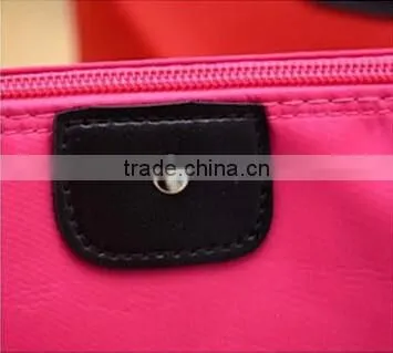 YIWU RODA 100%nylon multicolor optional dumpling shape cosmetic bag