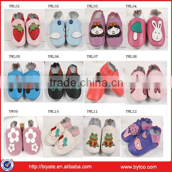 green flower decorating baby shoes