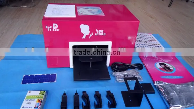 Nail art printer with nail supply