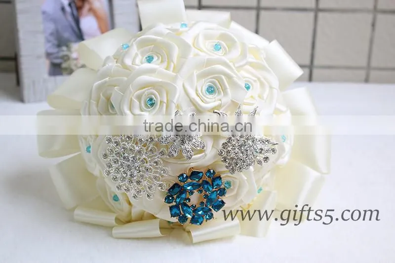 Customized Handmade wedding bouquets with gorgeous blue/ silver brooch