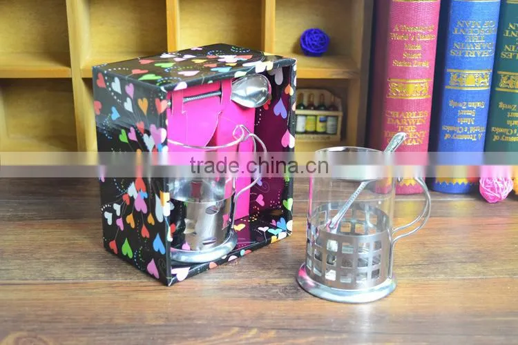 Glass coffee mug with stainless steel base handle