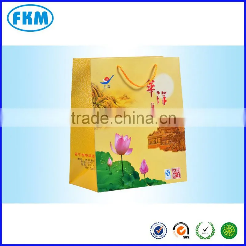 yellow striped paper bag