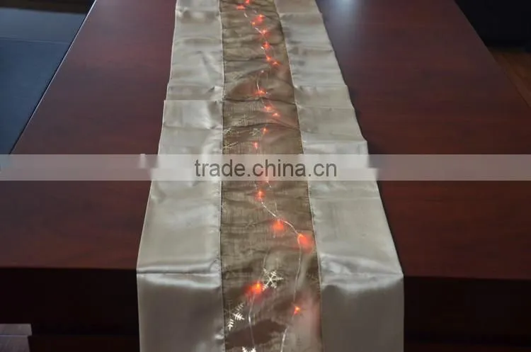 Fancy red wedding table runner with LED lights