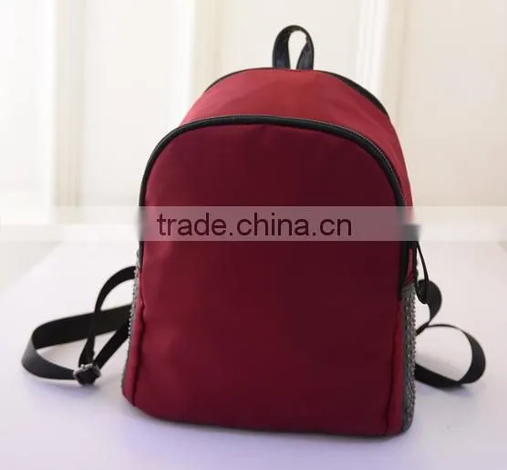 Fashion rivet decorate nylon backpack china factory