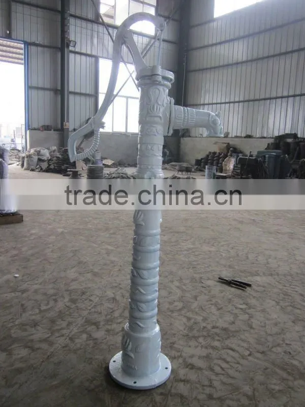 cast iron hand pump garden villiage using
