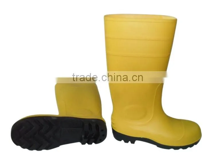 White PVC rain boots with steel toe