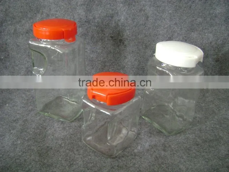 square glass jar with plastic lid