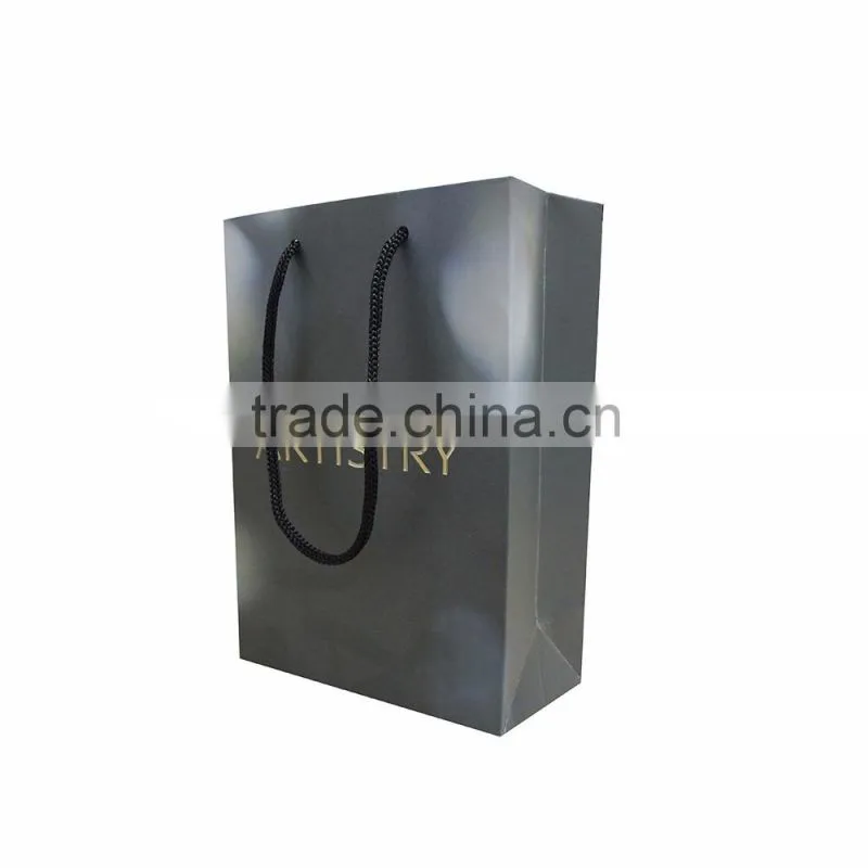 Embossed logo die cut handle paper bag