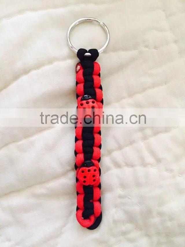Hot sale rainbow paracord woven keychain, rainbow rope 550 to make keychain, rainbow 550 paracord survival keychain
