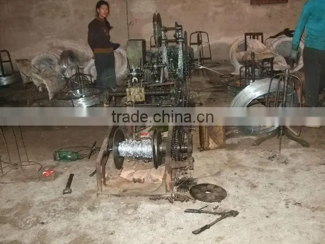 Cheap barbed wire(weight 25kg per coil )