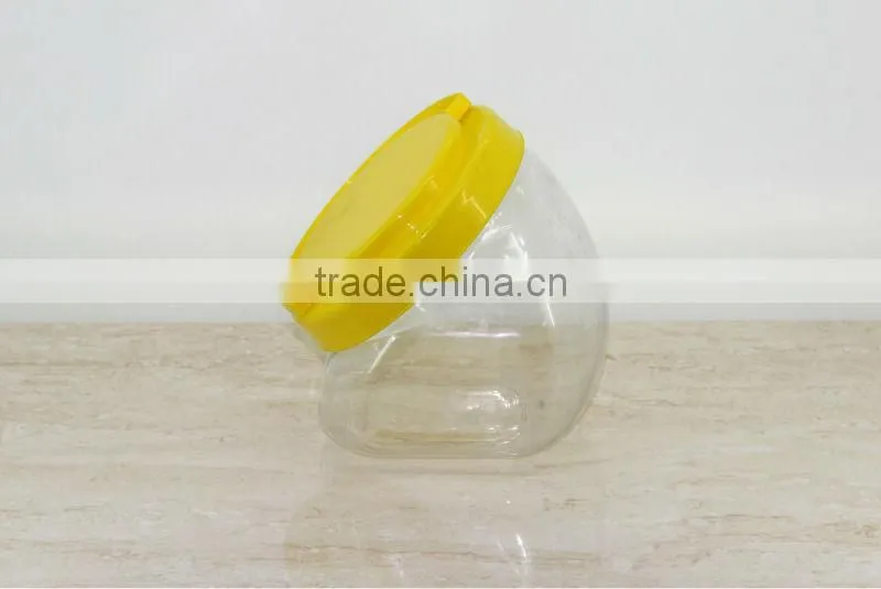 clear candy plastic jar with yellow screw cap
