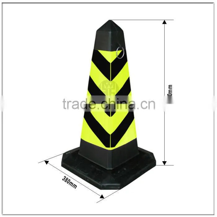 Yellow and black plastic traffic cones