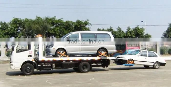 Sinotruck howo heavy duty flatbed rotator tow truck wrecker wheel lift for sale with arm crane